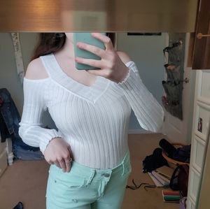 Form fitting white peek a boo sweater